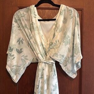 Beautiful floral gown with floral print. Very flattering.